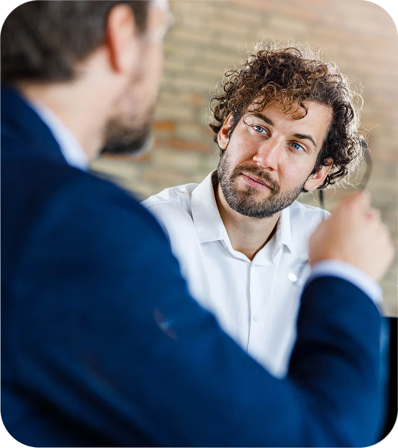 A Wellcove team member meeting face to face with a carrier partner